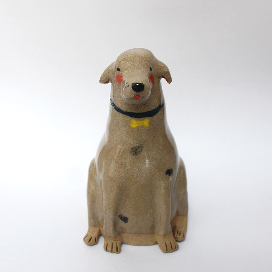 Dog sculpture ceramic.