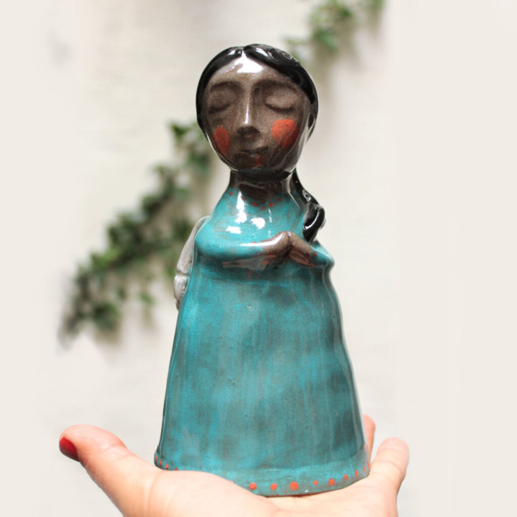 Ceramic angel sculpture